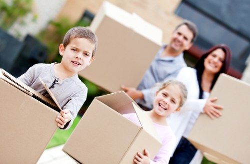 Boxes and furniture being loaded from an apartment building in Bromley